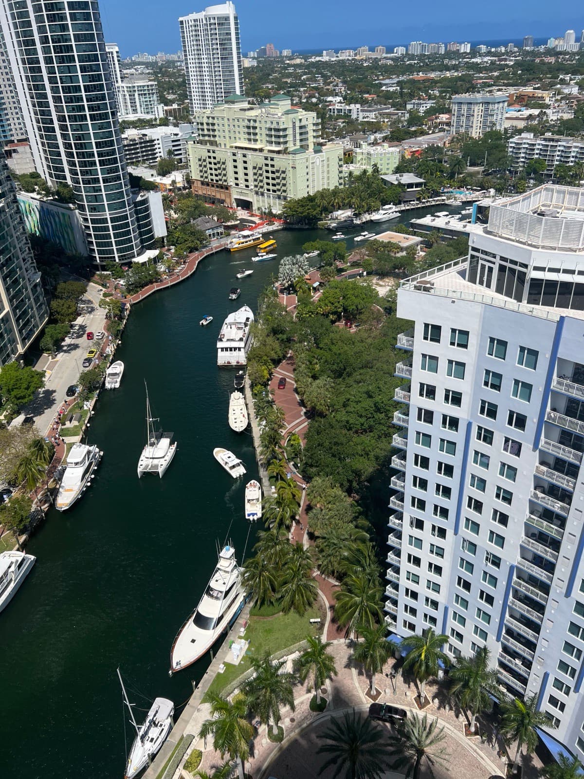 Aerial view of Riverside Hotel along the New River with downtown Fort Lauderdale skyline