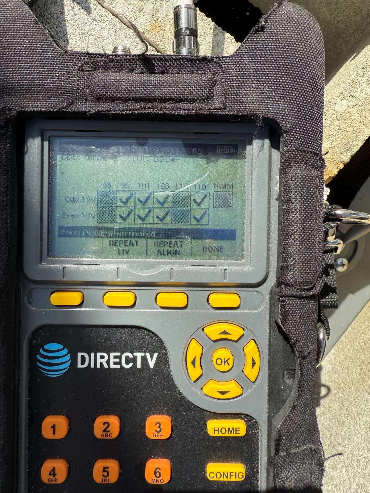 DIRECTV signal meter verifying transponder lock during commercial install