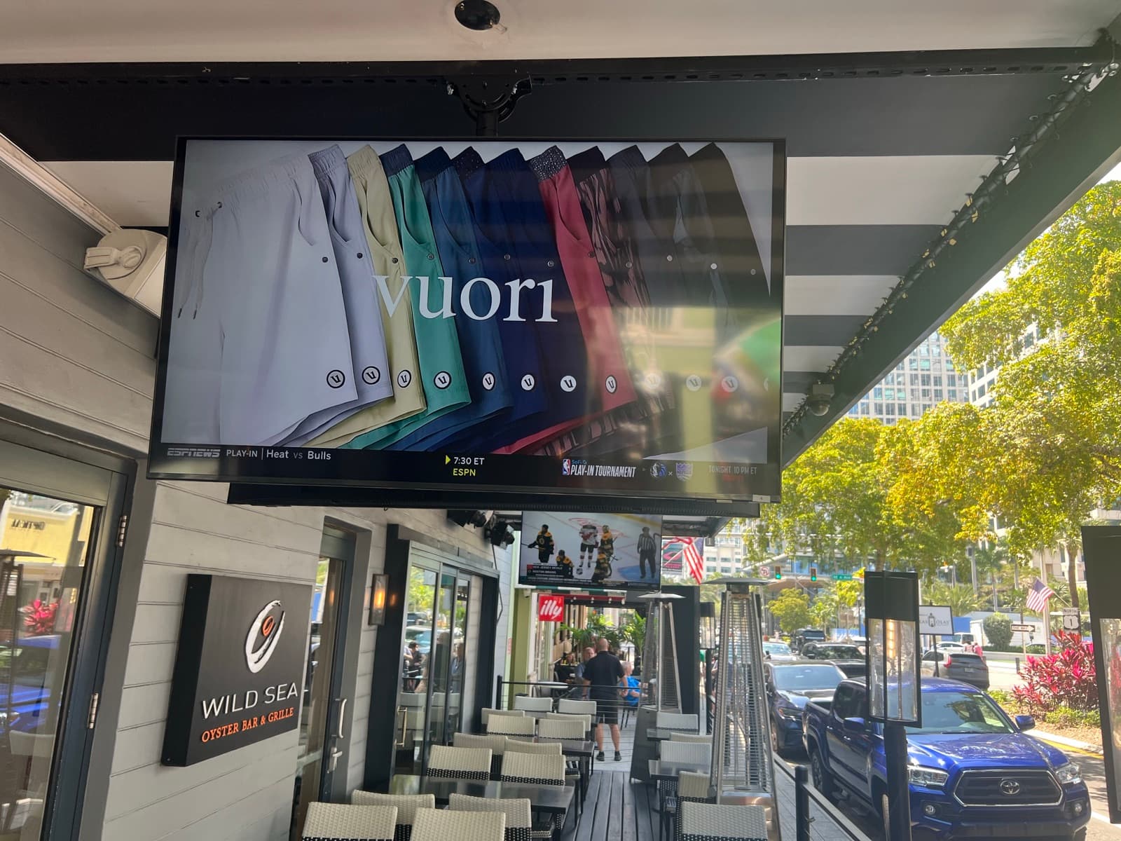 Wall-mounted commercial display showing ESPN content at the Wild Sea entrance