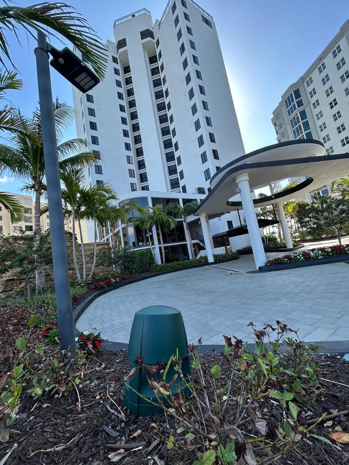 Pointe Estero tower entrance and porte-cochere from the property courtyard