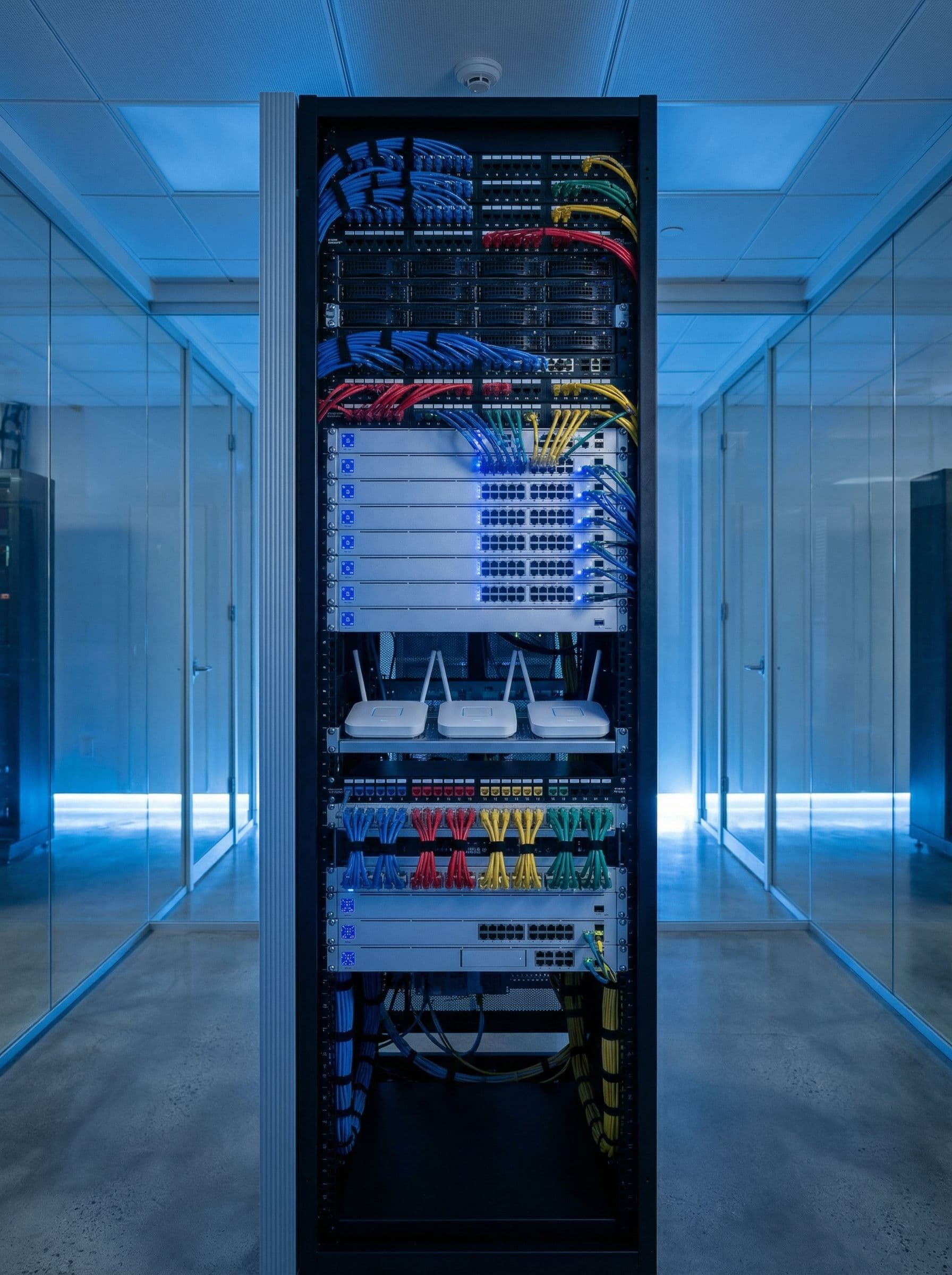 Modern campus network rack with high-density access points and security infrastructure