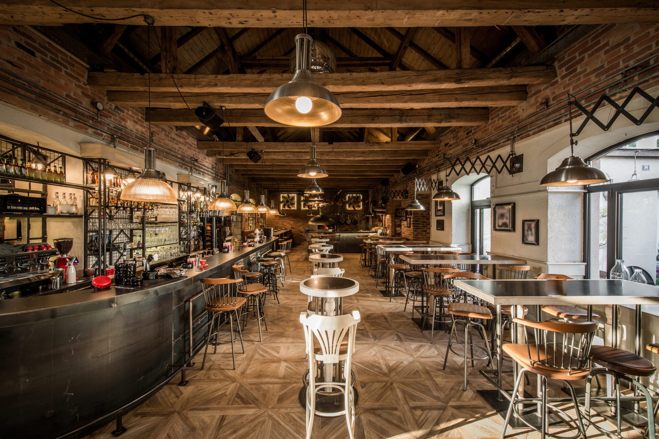 Cozy rustic-style bar with wooden beams and vintage décor.