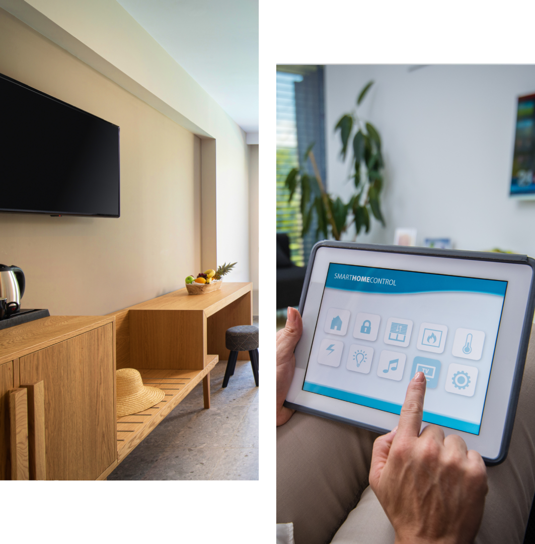 Person using a tablet to control smart home devices in a modern living room.