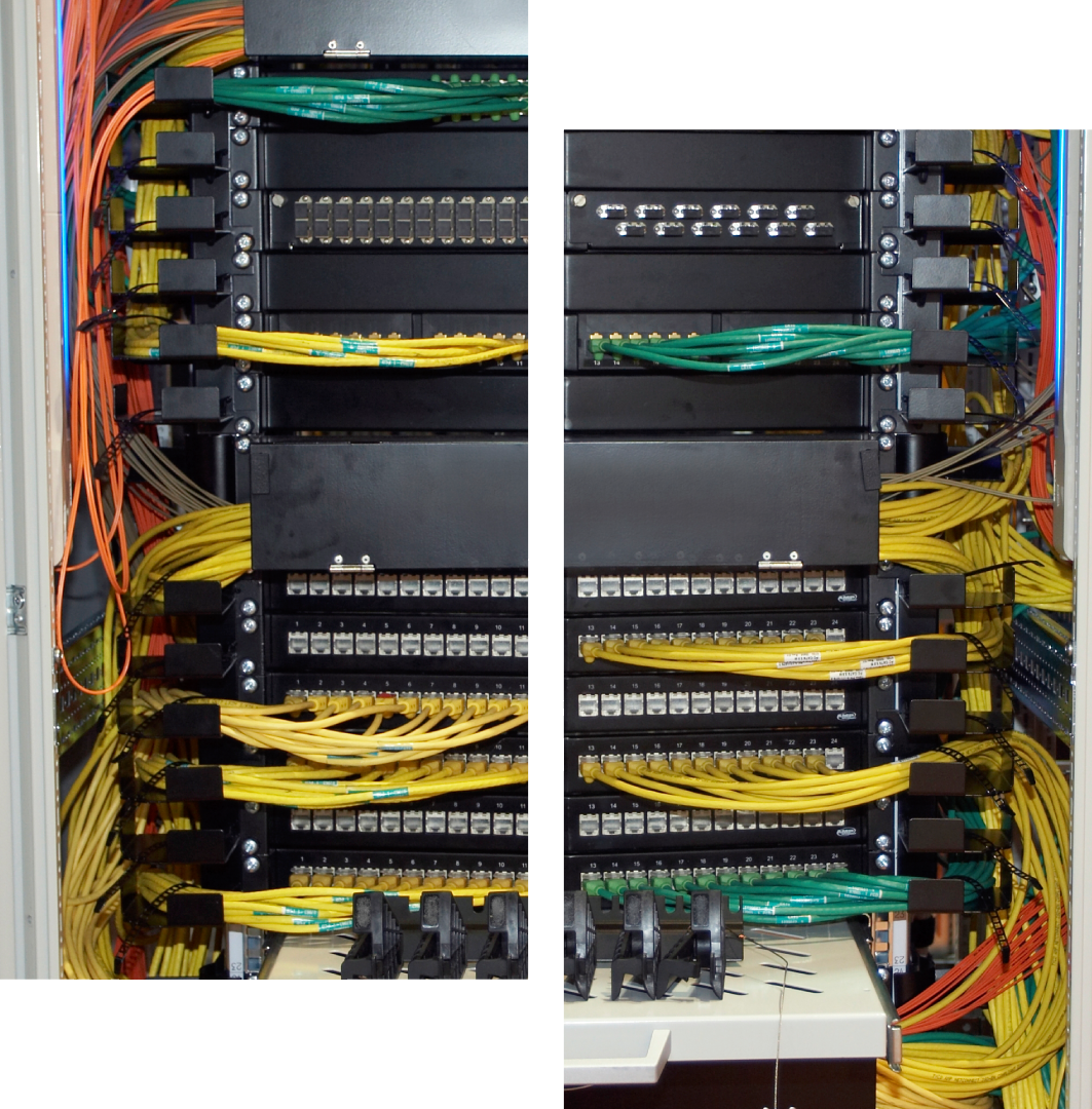 Organized server rack with neatly arranged yellow network cables.